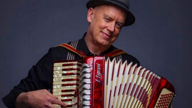 Rinde Eckert playing his accordion.